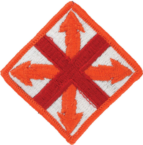 Red and white embroidered patch with a cross design on a white background