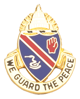 Coat of arms with a blue shield, red hand, and gold border, featuring the text 'We Guard the Peace'.