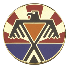 Circular emblem with a stylized eagle design on a white background