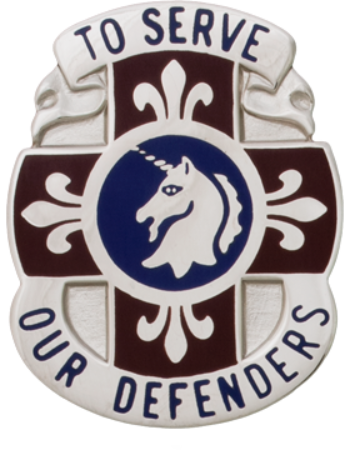 metal unit crest with a horse head emblem and text 'To Serve Our Defenders' on a silver metal background