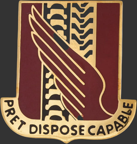 Metal Unit Crest with winged tire design and text 'PRET DISPOSE CAPABLE' on a burgundy and gold metal background