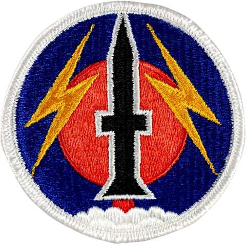 Circular embroider patch with a central knife design, flanked by two yellow lightning bolts on a blue background.