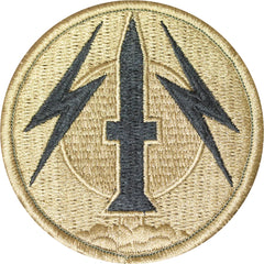 Circular patch with a central cross flanked by two lightning bolts on a beige background