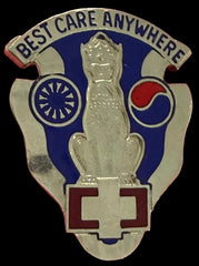 Metal unit crest with 'Best Care Anywhere' text and a logo on a silver metal