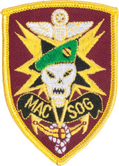 Patch with skull, green hat, and 'MAC SOG' text on a red and yellow background