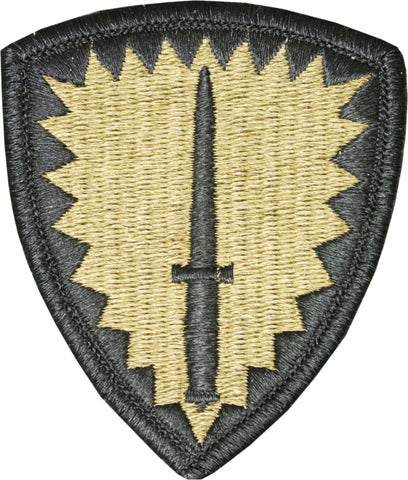 Military embroidered patch with a shield design and central sword on a white background