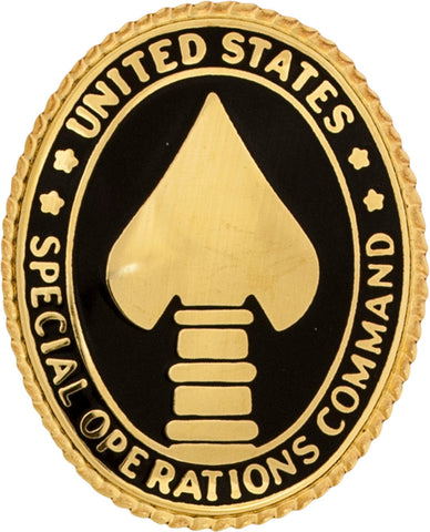 oval metal pin with black background and a gold emblem in the middle and letter around United States Special Operations Command