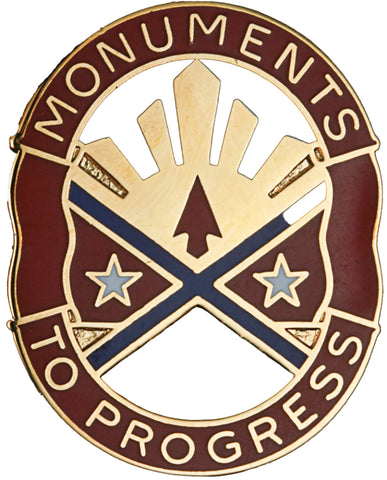Metal Unit Crest with 'Monuments to Progress' text and architectural elements on a white background