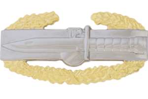 Combat Action metal badge in silver and gold metal emblem 