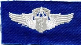 AIR FORCE CHIEF FLIGHT SURGEON BADGE ON BLUE CLOTH