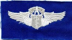 AIR FORCE CHIEF FLIGHT SURGEON BADGE ON BLUE CLOTH - Saunders Military Insignia
