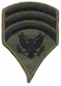 US Army Specialist 7th chevron in green subdued cloth